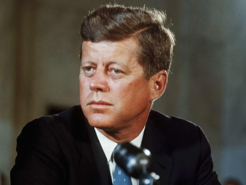 <p>Bettmann</p> President John F. Kennedy at his desk in the White House on his first day in office as President of the United States.