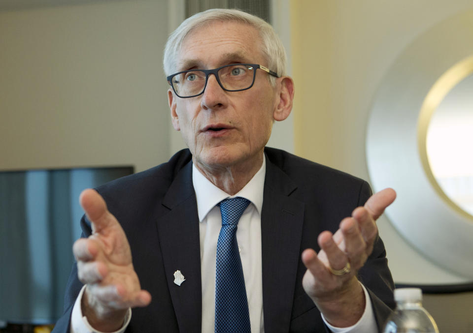 FILE - In this Feb. 23, 2019 file photo, Wisconsin Gov. Tony Evers speaks during an interview during the National Governors Association 2019 winter meeting in Washington. Evers said Thursday, March 14, that the state budget he proposed is "pretty close" to not raising taxes, even though it would increase them by $1.3 billion over two years. Evers, in an interview on WTMJ radio, said that there "may be some small tax increases." The comments drew an incredulous reaction from Republican legislative leaders.(AP Photo/Jose Luis Magana, File)