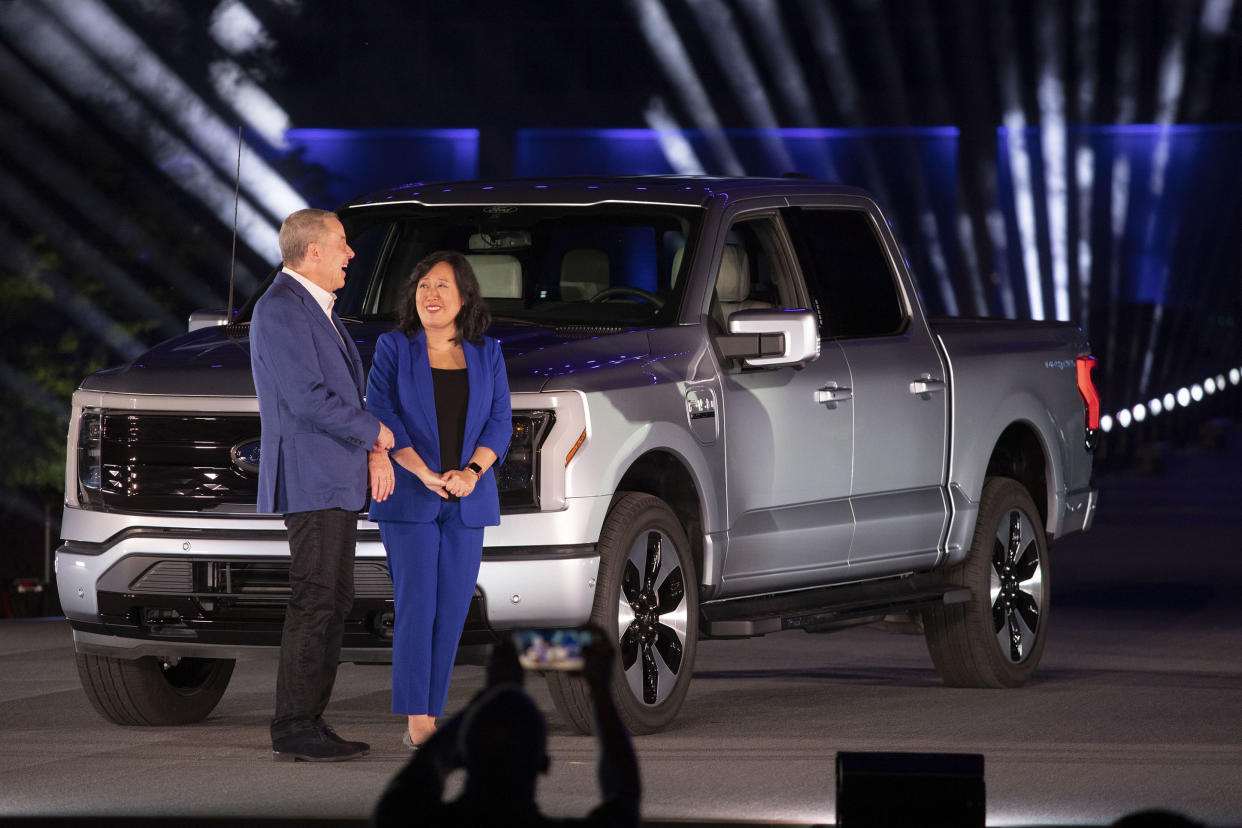 DEARBORN, MI - MAY 19: Bill Ford, Jr., Executive Chairman of Ford Motor Company and Linda Zhang, Chief Engineer, attend the reveal of the new all-electric Ford F-150 Lightning pickup truck at Ford World Headquarters on May 19, 2021 in Dearborn, Michigan. The truck will be built at the all-new Ford Rouge Electric Vehicle Center in Dearborn starting in the Spring of 2022. (Photo by Bill Pugliano/Getty Images)