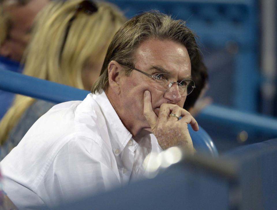 Jimmy Connors, coaching Maria Sharapova, from Russia, for the first time looks on in her loss to Sloane Stephens, from the United States, in a match at the Western & Southern Open tennis tournament, Tuesday, August 13, 2013, in Mason, Ohio. (AP Photo/Michael E. Keating)