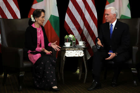 Myanmar's State Counsellor Aung San Suu Kyi and U.S. Vice President Mike Pence hold a bilateral meeting in Singapore, November 14, 2018. REUTERS/Athit Perawongmetha