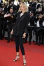 <p>Uma changed the Cannes red carpet rules in a chic fitted suit.<br><i>[Photo: Getty]</i> </p>