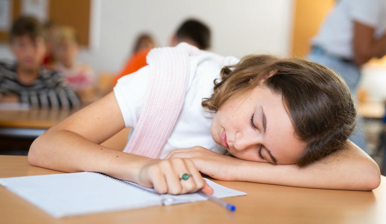 About 58% of middle schoolers and 73% of high schoolers do not get enough sleep. <a href="https://www.gettyimages.com/detail/photo/girl-is-tired-and-sleeping-at-the-desk-in-classroom-royalty-free-image/1503343198?phrase=students+sleeping+in+class" rel="nofollow noopener" target="_blank" data-ylk="slk:JackF via iStock / Getty Images Plus;elm:context_link;itc:0;sec:content-canvas" class="link ">JackF via iStock / Getty Images Plus</a>