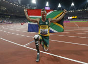 South Africa's Oscar Pistorius celebrates winning the Men's 400m T44 classification at the Olympic Stadium during the London 2012 Paralympic Games September 8, 2012 REUTERS/Eddie Keogh (BRITAIN - Tags: SPORT OLYMPICS ATHLETICS) - RTR37PB3