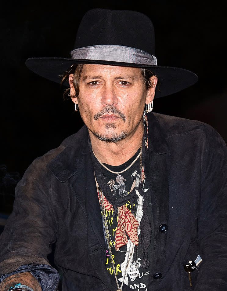 Johnny Depp is apologizing after the immediate backlash to his off-the-cuff “bad joke” about assasinating the president. (Photo: Harry Durrant/Getty Images)