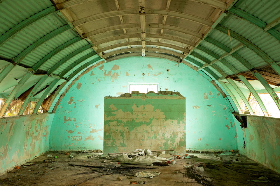 Inside one of the Quonset huts, which were used as barracks before being abandoned by the U.S. military, in Subic Bay.<span class="copyright">Geric Cruz for TIME</span>