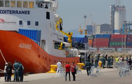 Refugees disembark the Aquarius rescue ship in the port in Valencia, Spain, June 17, 2018. REUTERS/Heino Kalis/Files