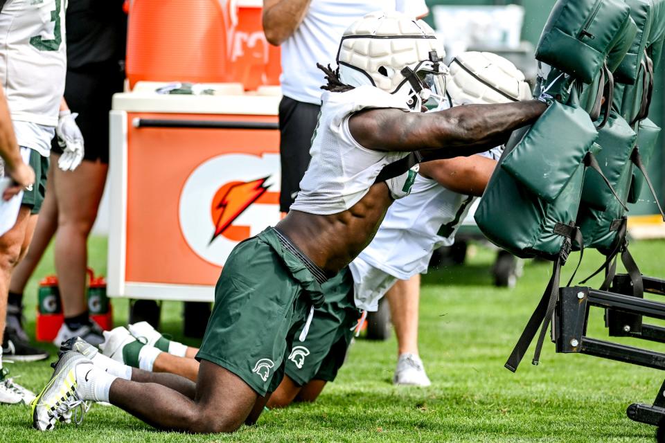 Michigan State's Jordan Turner participates in a drill during the first day of football camp on Tuesday, July 30, 2024, in East Lansing.