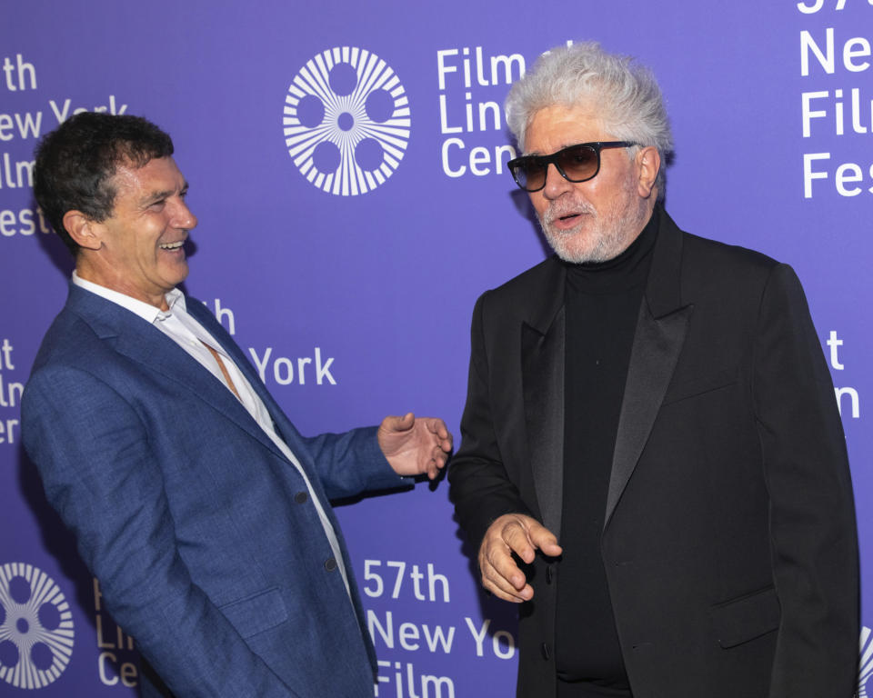 FILE - This Sept. 28, 2019 file photo shows actor Antonio Banderas, left, and director/screenwriter Pedro Almodovar at the premiere of "Pain and Glory" during the 57th New York Film Festival in New York. Almodóvar has found international acclaim with 21 films shot in his native Spain. He says that his next production will be set in Texas and would be mostly in English, with some bilingual scenes in Mexico. (Photo by Brent N. Clarke/Invision/AP, File)