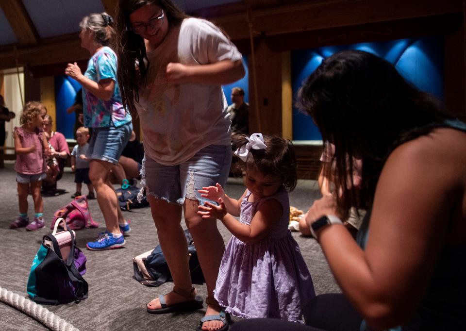 Bina Harlig, Lucia Camarena and Hailey Camarena dance during CuentaCuentos, a Spanish-language story hours held at Nashville Public Library in Nashville, Tenn., on Wednesday, July 26, 2023.