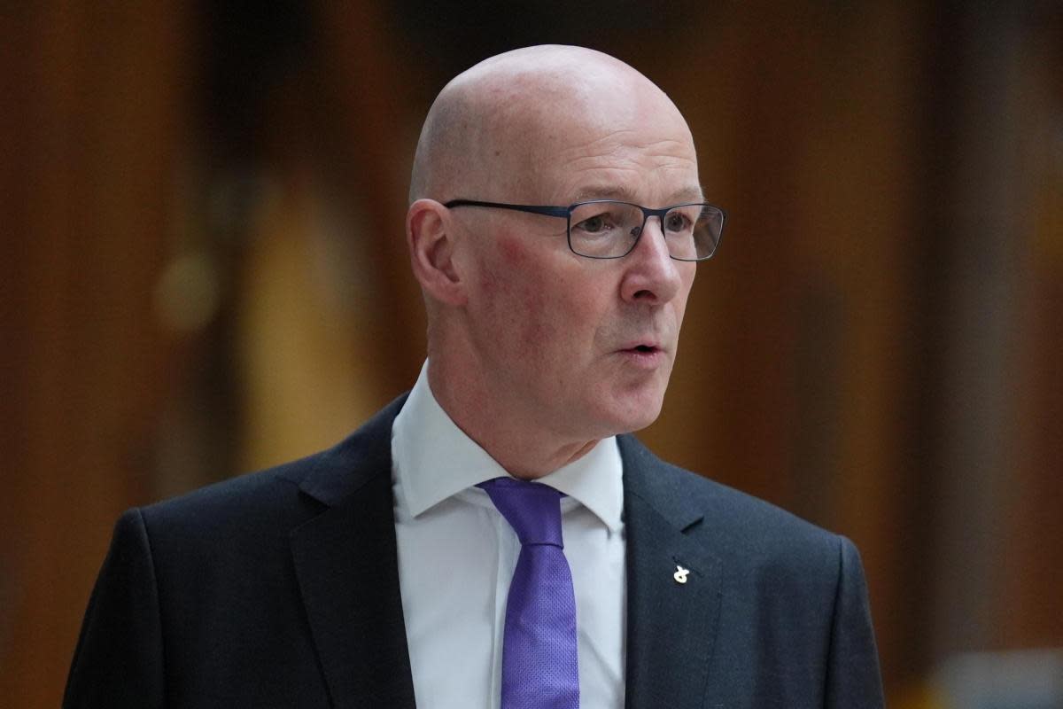 John Swinney said he was 'deeply grateful' to his family for thier support <i>(Image: PA)</i>