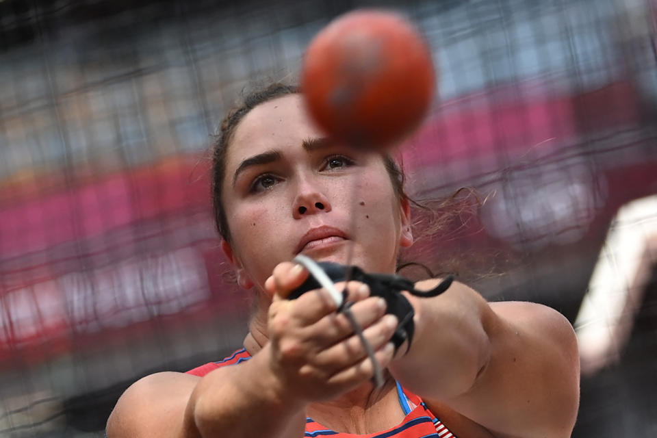 <p>USA's Brooke Andersen competes in the women's hammer throw qualification during the Tokyo 2020 Olympic Games at the Olympic Stadium in Tokyo on August 1, 2021. (Photo by Andrej ISAKOVIC / AFP)</p> 