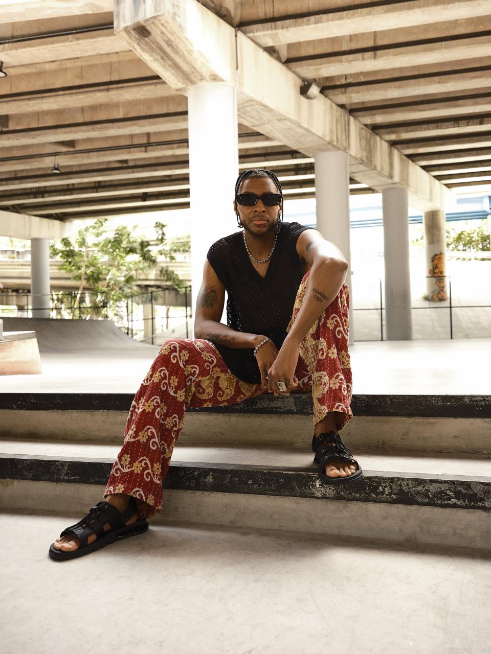 Masego poses in Kenner shoes in Miami for the brand's campaign shoot.
