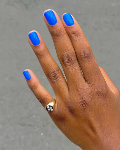 <p>Julia Diogo Instagram</p> Electric blue nails by @paintedbyjools.