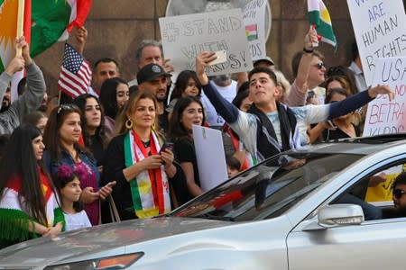 A crowd of over 500 people protest in support of Kurds after the Trump administration changed its policy in Syria