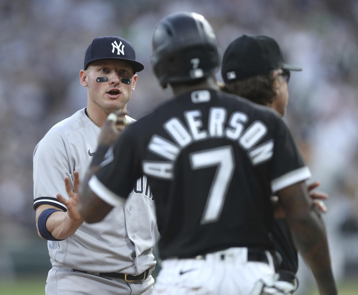 New York Yankees third baseman Josh Donaldson, left, and Chicago White Sox baserunner Tim Anderson