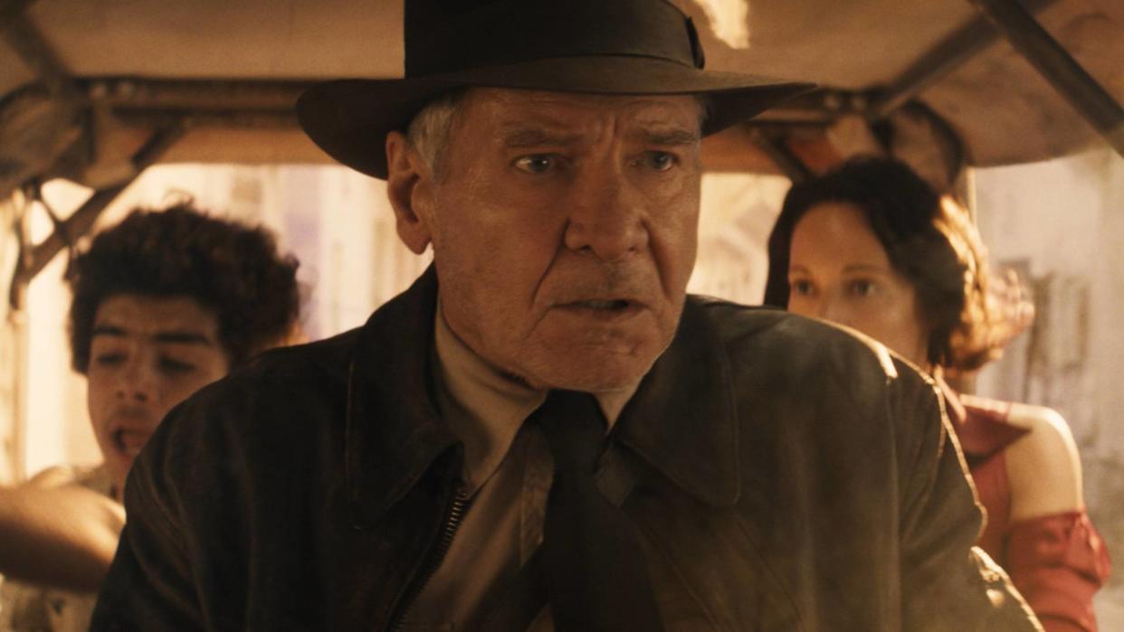  Harrison Ford as Indiana Jones and James Mangold 