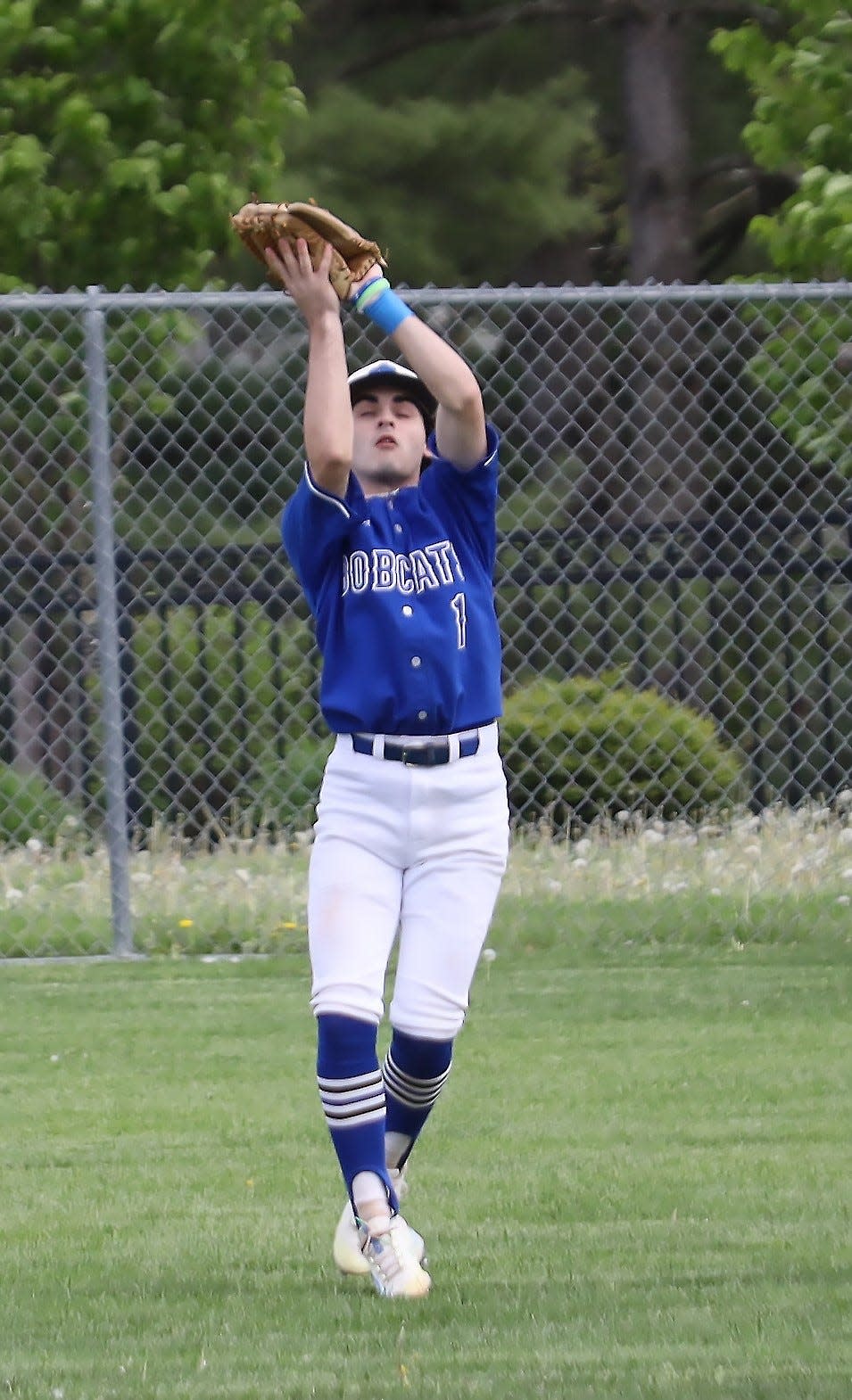 Cambridge's Konner McIntire (1) catches the ball during the Bobcats versus Colts baseball game at Don Coss Friday night.