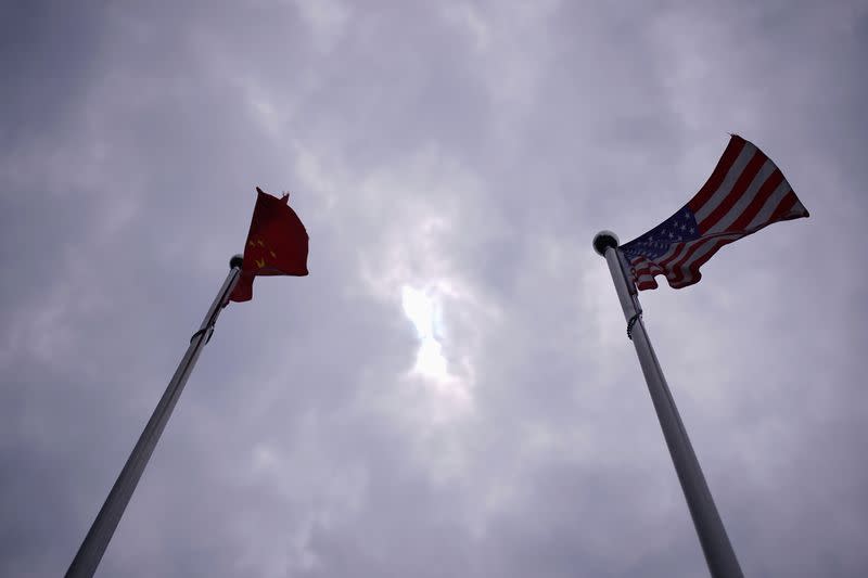 Chinese and U.S. flags flutter in Shanghai