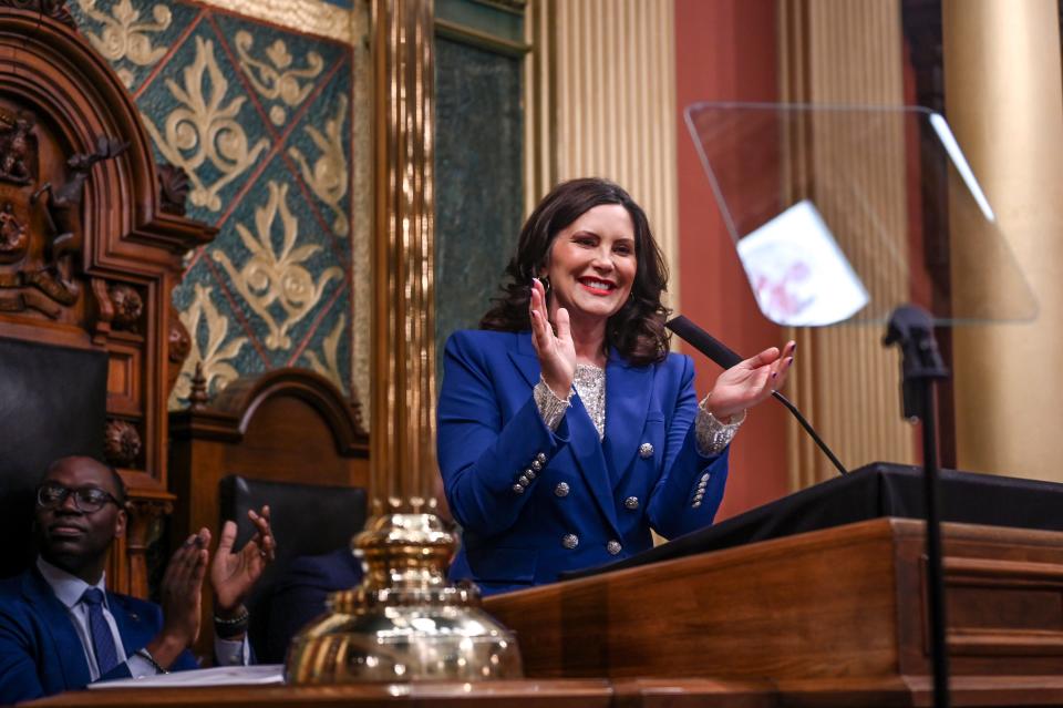 Gov. Gretchen Whitmer applauds while delivering her State of the State address on Wednesday, Jan. 24, 2024, at the Michigan State Capitol in Lansing.