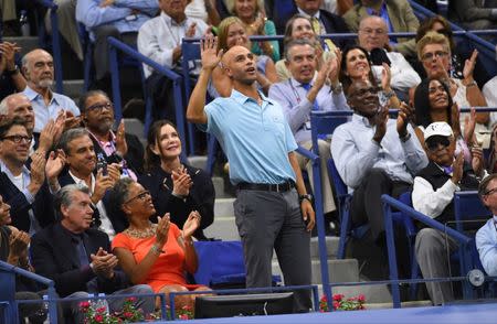 FILE PHOTO - Sep 11, 2015; New York, NY, USA; Former player James Blake acknowledges the crowd during the match between Roger Federer of Switzerland and Stan Wawrinka of Switzerland on day twelve of the 2015 U.S. Open tennis tournament at USTA Billie Jean King National Tennis Center. Mandatory Credit: Robert Deutsch-USA TODAY Sports