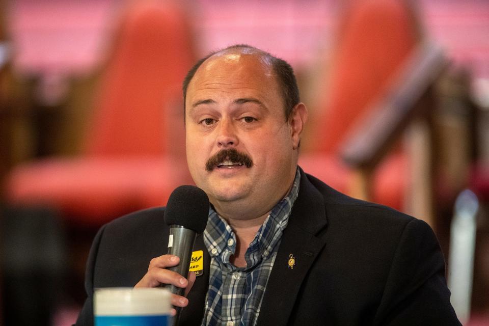 Polk County School Board candidate Justin Sharpless speaks at a forum in July sponsored by the Lakeland Branch NAACP. Sharpless vied against Sara Jones for an open seat in District 6.