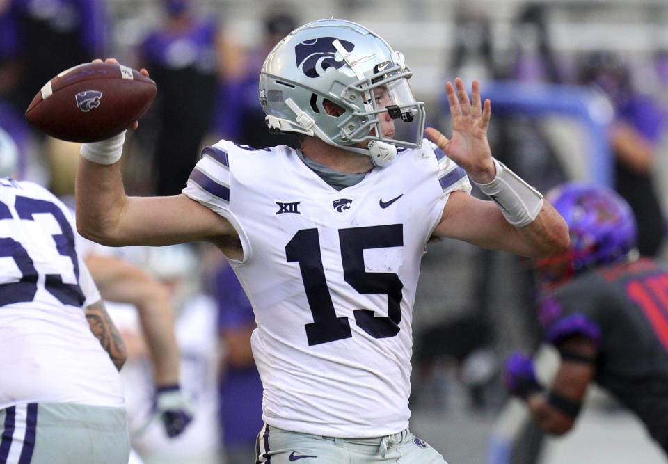 Kansas State quarterback Will Howard (15) looks for an open receiver in the fourth quarter of an NCAA college football game against TCU, Saturday, Oct. 10, 2020, in Fort Worth, Texas. (AP Photo/Richard W. Rodriguez)