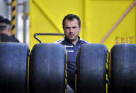 A man pushes tires at the Circuit de Monaco on May 25, 2012 in Monte Carlo. AFP PHOTO / BORIS HORVATBORIS HORVAT/AFP/GettyImages