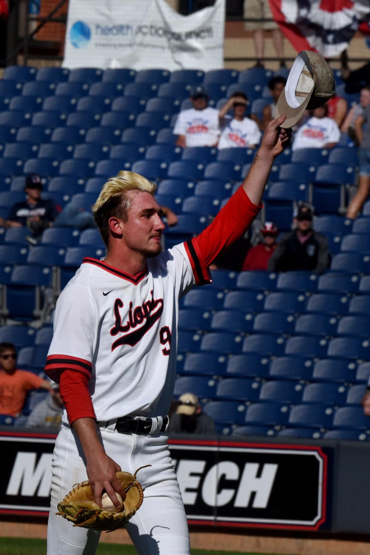 Liberty Union senior pitcher Jacob Miller waves to fans as he leaves the mound after pitching against Waynedale in a Division III state semifinal on Thursday, June 9, 2022, at Canal Park in Akron. The Lions lost 4-3.