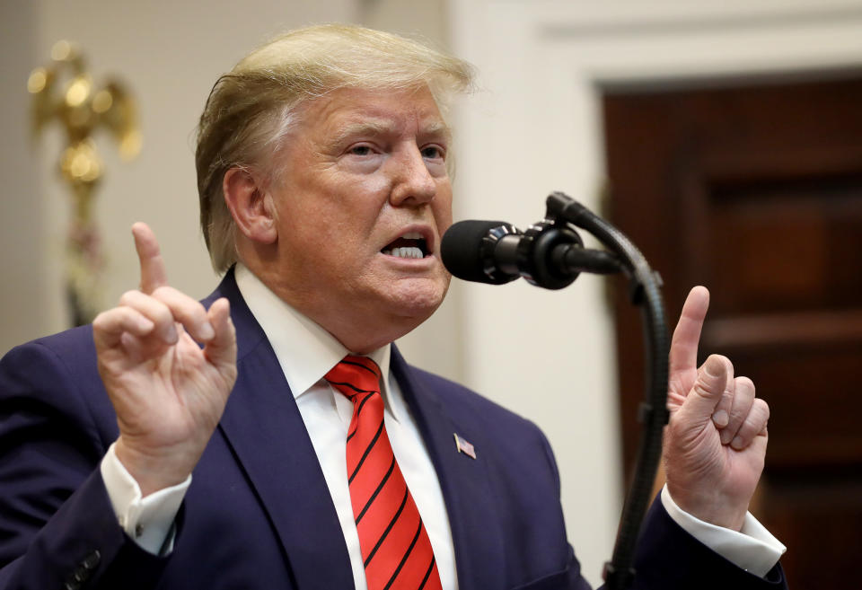 WASHINGTON, DC - OCTOBER 09:  U.S. President Donald Trump responds to a question from a reporter at an event for the signing of two executive orders aimed at greater governmental transparency at the White House October 9, 2019 in Washington, DC. Trump answered questions on the pending impeachment inquiry and the Turkish offensive into northern Syria following the signing of the executive orders. (Photo by Win McNamee/Getty Images)