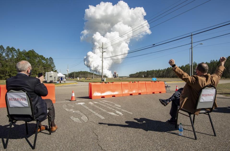 <div class="inline-image__caption"><p>Acting NASA Administrator Steve Jurczyk, left, and Rick Gilbrech, director of NASA's Stennis Space Center, right, watch as the core stage for the first flight of NASAs Space Launch System rocket undergoes a second hot fire test in the B-2 Test Stand on March 18. </p></div> <div class="inline-image__credit">NASA/Robert Markowitz via Getty</div>