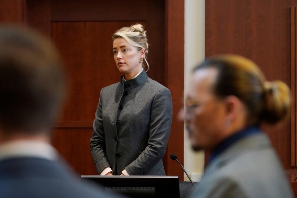 Amber Heard and Johnny Depp during the trial in Fairfax County Circuit Court on May 16, 2022.