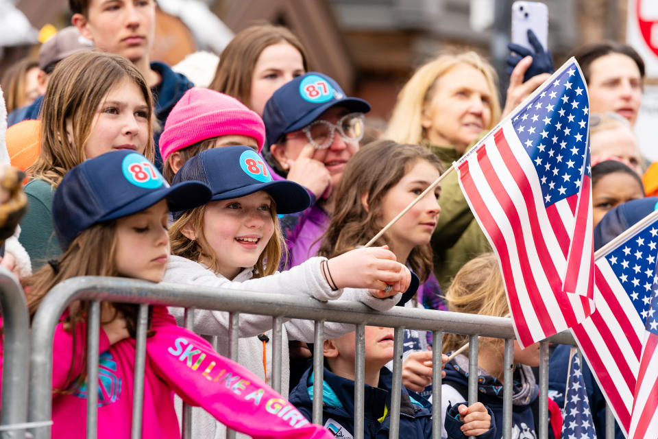 The Olympian handed out hats and pins imprinted with “Mikaela87.”