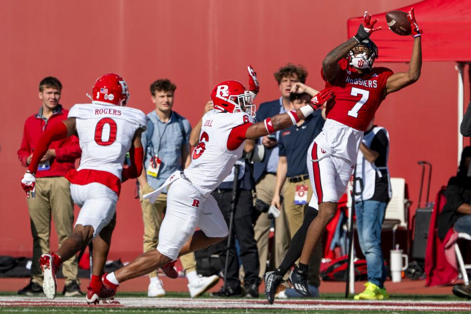 Oct 21, 2023; Bloomington, Indiana, USA; Indiana Hoosiers wide receiver E.J. Williams Jr. (7) misses a pass in the end zone in front of Rutgers Scarlet Knights defensive back Shaquan Loyal (6) during the second half at Memorial Stadium. Mandatory Credit: Marc Lebryk-USA TODAY Sports