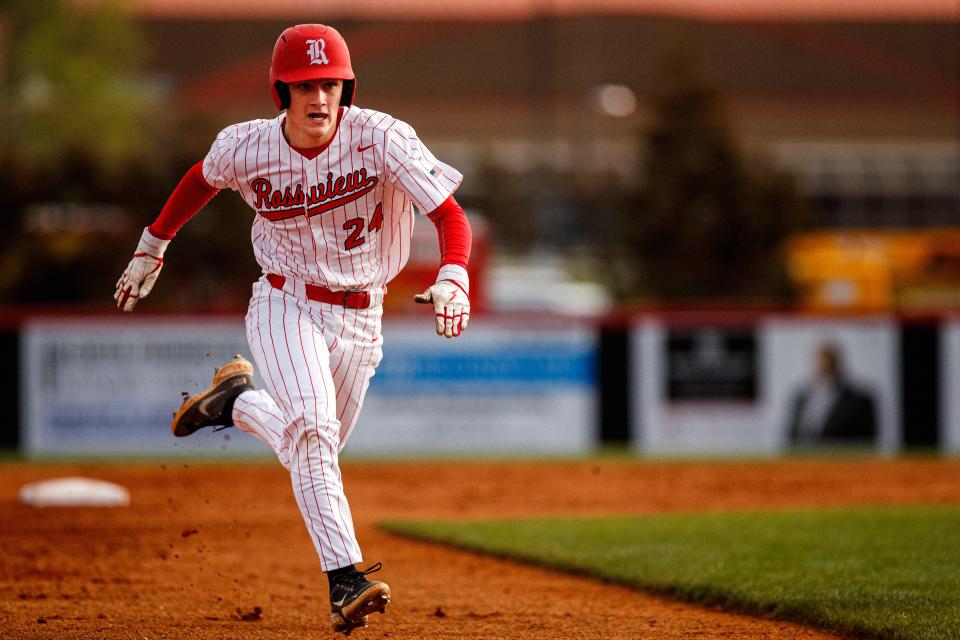 Rossview Hawks Drew Morehead (24) steals third base during a baseball game at Rossview High School in Clarksville, Tenn. on Apr 8, 2023.