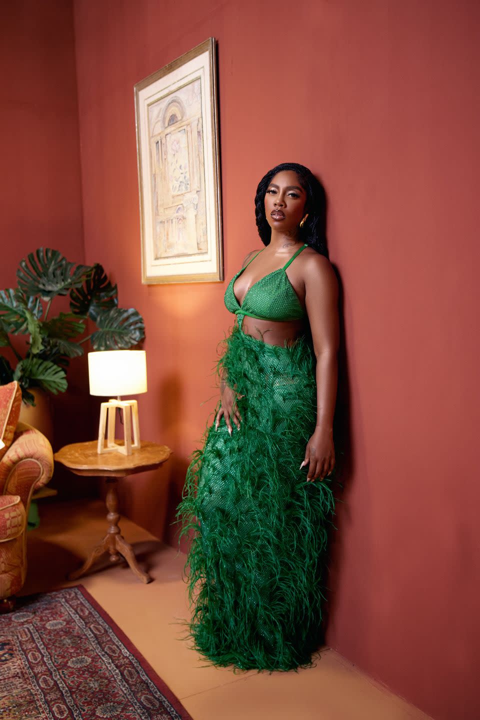 tiwa savage in a green dress