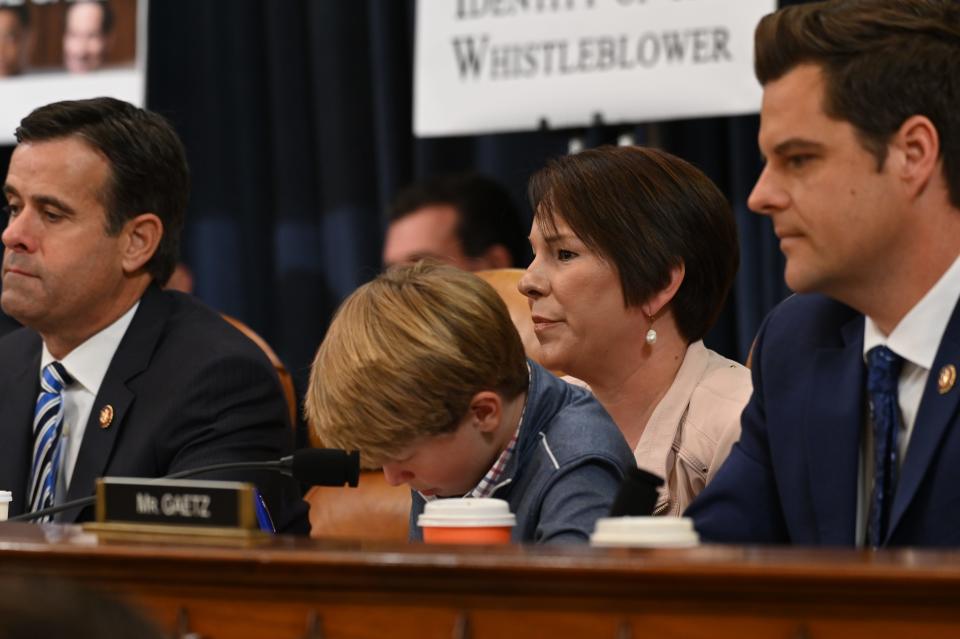 George Roby sits with his mother Rep. Martha Roby, R-AL. as the House Judiciary Committee takes a roll call on the articles of impeachment against President Donald J. Trump in Washington, DC on Dec. 13, 2019.