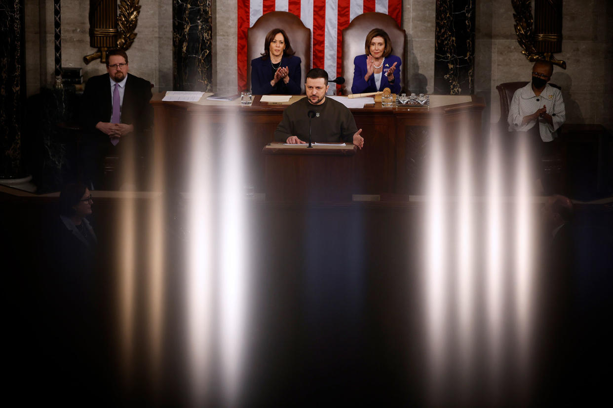 Vice President Kamala Harris and Speaker of the House Nancy Pelosi listen to President of Ukraine Volodymyr Zelensky as he addresses a joint meeting of Congress in the House Chamber of the U.S. Capitol on Dec. 21, 2022.<span class="copyright">Chip Somodevilla—Getty Images</span>