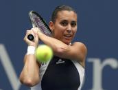 Flavia Pennetta of Italy returns volley to compatriot Roberta Vinci during their women's singles final match at the U.S. Open Championships tennis tournament in New York, September 12, 2015. REUTERS/Brendan McDermid
