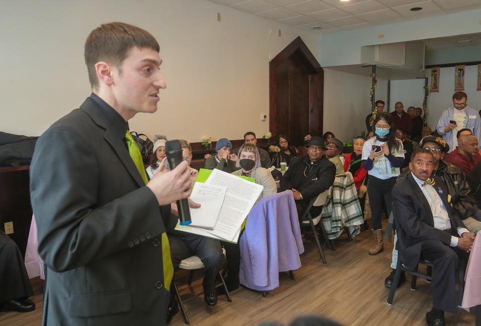 Akron mayoral candidate Joshua Schaffer answers a question from the audience Saturday.