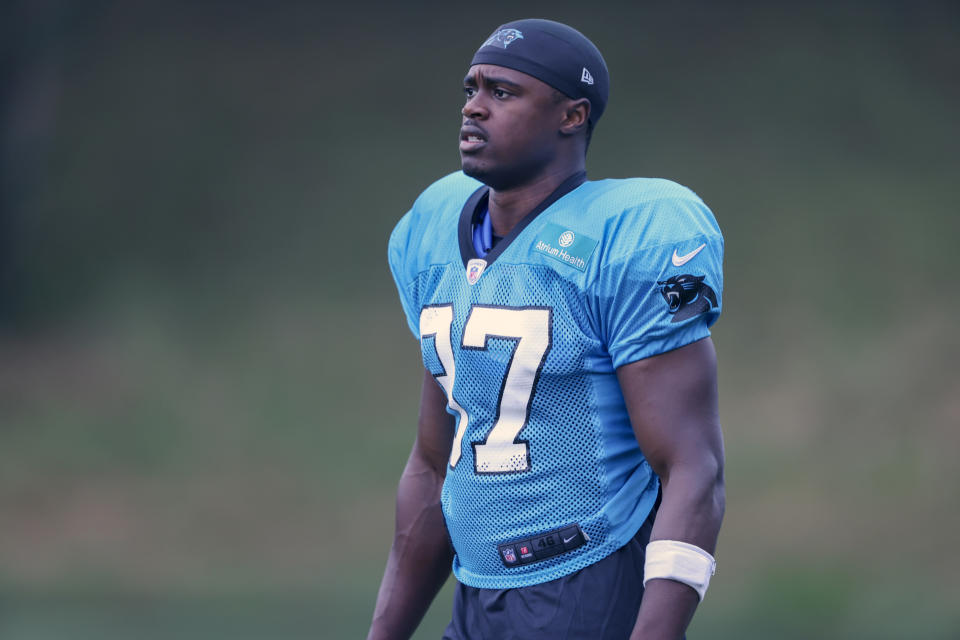 Carolina Panthers defensive back J.T. Ibe walks onto the practice field at the NFL football team's training camp in Spartanburg, S.C., Tuesday, Aug. 3, 2021.  Ibe was kicked out of practice after a hit that injured wide receiver Keith Kirkwood. (AP Photo/Nell Redmond)