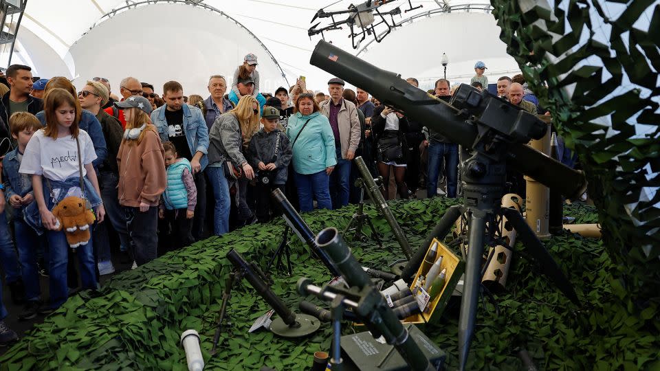 People visit an exhibition, displaying armored vehicles and equipment captured by the Russian army from Ukrainian forces, at Victory Park open-air museum in Moscow, Russia, on May 1, 2024. REUTERS/Evgenia Novozhenina - Evgenia Novozhenina/Reuters