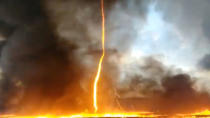 <p>A fire whirl develops from a blaze in the village of Woodville, Britain Aug. 7, 2018 in this still image taken from social media video. (Photo: Leicestershire Fire and Rescue Service via Reuters) </p>