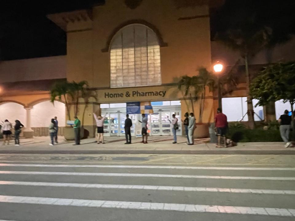 Shoppers lined up Friday waiting for a Coral Springs, Florida Walmart to open for Black Friday deals.