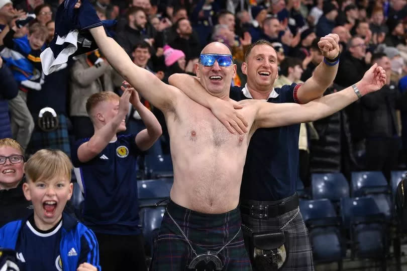 Scotland fans celebrating a 'pure dead brilliant' win over Spain