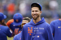 FILE - New York Mets pitcher Jacob DeGrom smiles after the team's baseball game against the Washington Nationals on Aug. 29, 2021, in New York. In his first start since last summer, the two-time Cy Young Award winner fired two innings of one-hit ball in New York's 2-0 victory over the Houston Astros in a preseason game Tuesday, March 22. (AP Photo/Corey Sipkin, File)