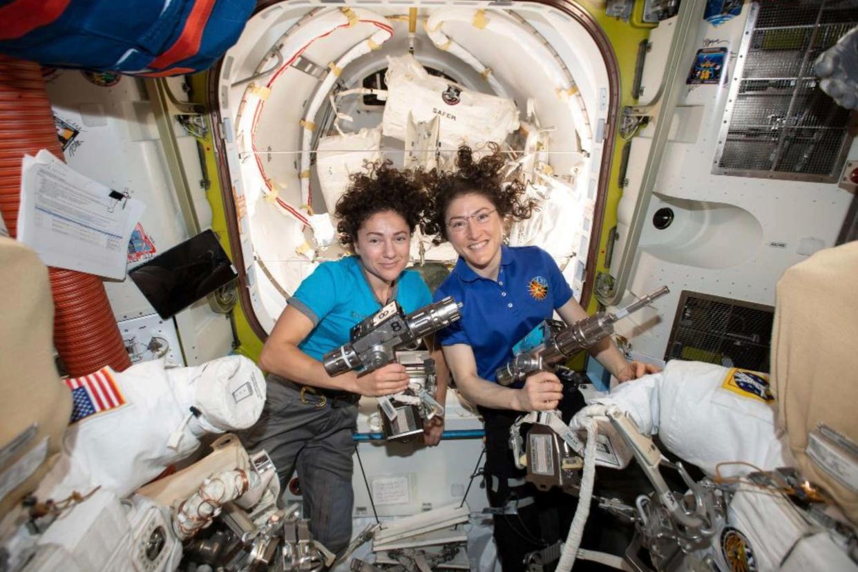 U.S. astronauts Jessica Meir, left, and Christina Koch pose for a photo in the International Space Station: AP