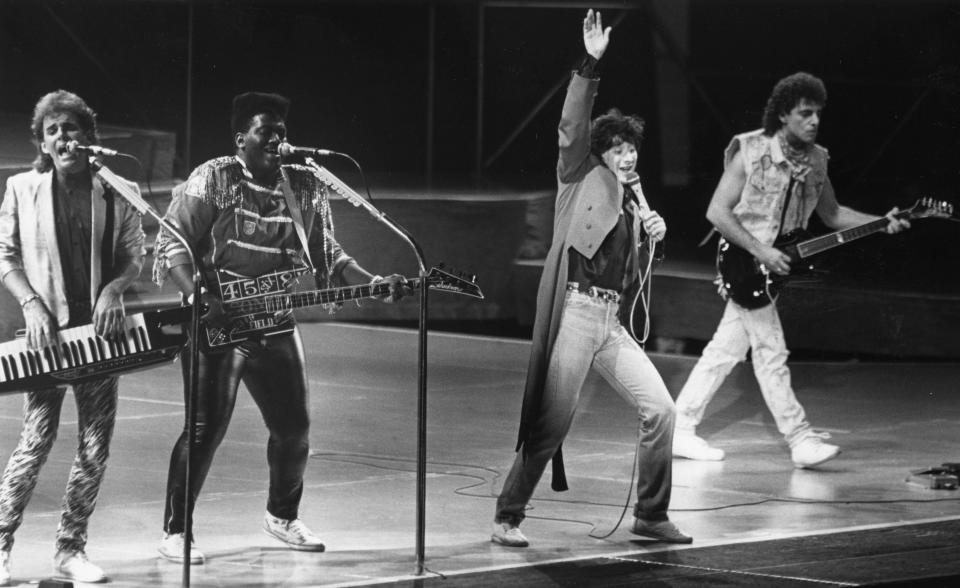 Nov. 21, 1986: Steve Perry (with hand raised) and the rock band Journey perform in front of a sold-out audience at the Jacksonville Coliseum. [Bruce Lipsky, The Times-Union]