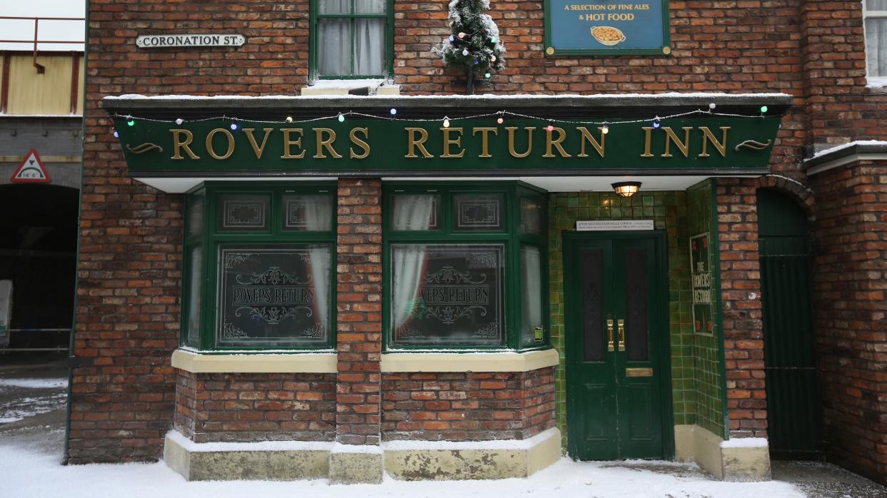  Rovers Return in the snow at Christmas - Coronation Street . 