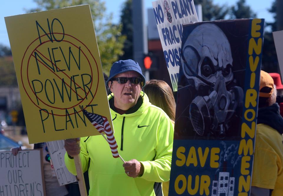 Tom Broffman of Dayville participates in a 2016 rally against the new proposed power plant along Lake Road in Dayville in this file photo.